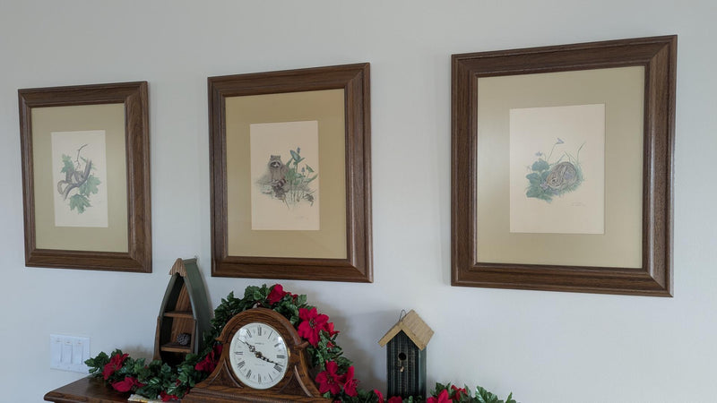 Three framed works by Glen Loates in a family collection